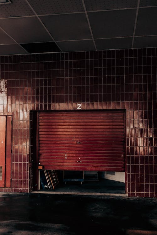 An old red commercial overhead garage door